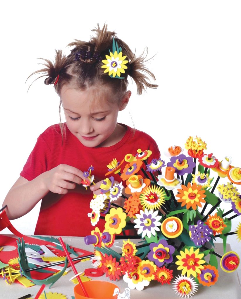 girl playing with the amazing flower kit